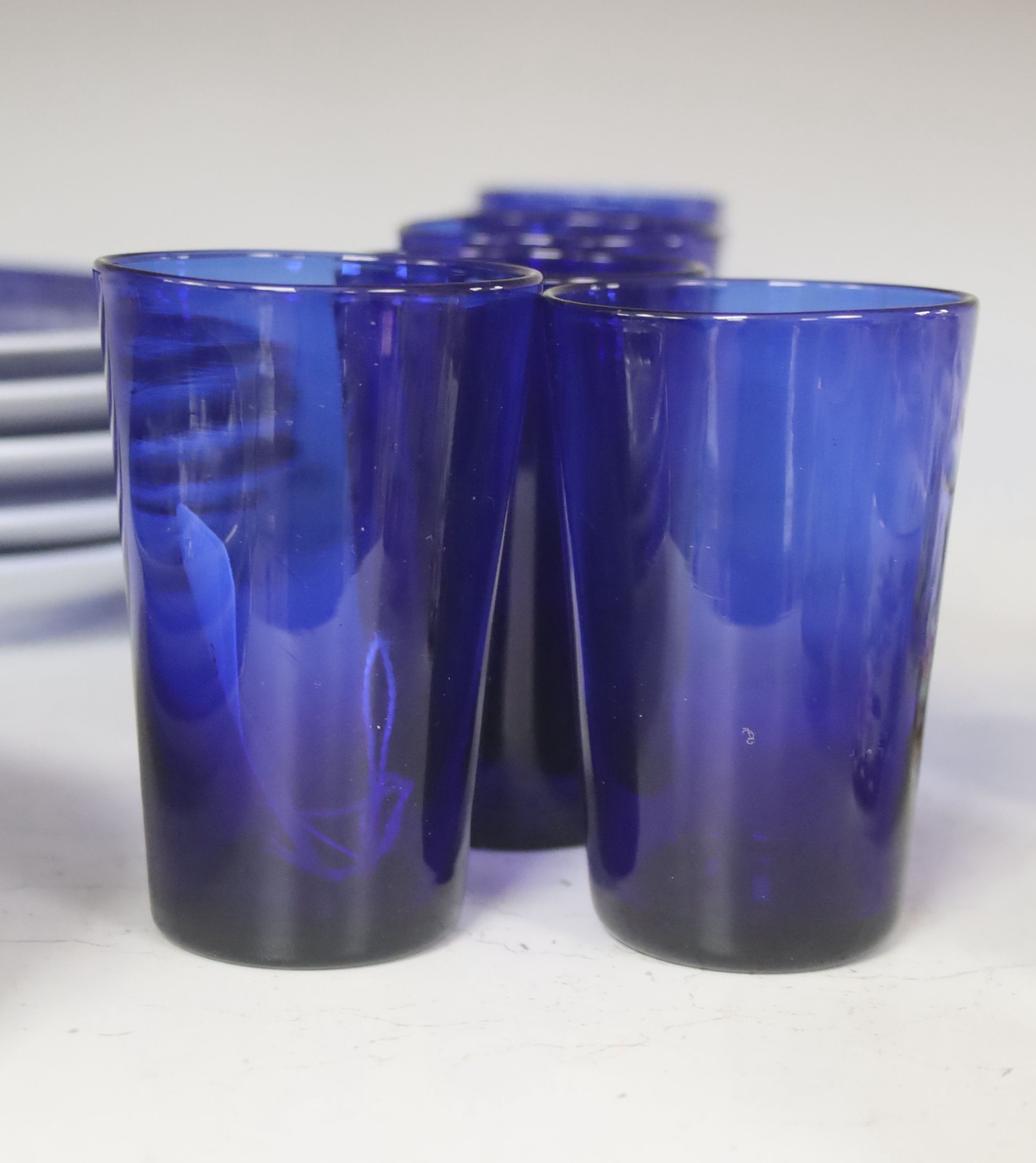 A set of six Bristol blue glass tumblers and eight Royal Copenhagen Christmas plates